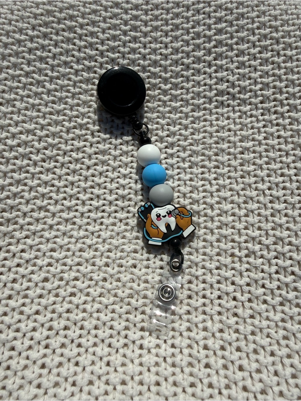 Cute Tooth Character Badge Reel with Blue and White Beads